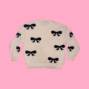Cream Sweater with Black Bow Accents